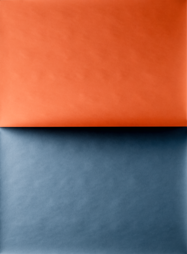 A tall abstract composition of two large flat colour planes, one warm and one cool, meeting along a single straight edge across the frame. A tall abstract composition of two large flat colour planes, one warm and one cool, meeting along a single straight edge across the frame.