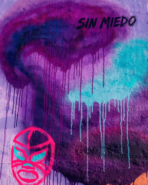 Sprayed field of purple, orange, turquoise and hot pink with drips, a lucha mask outlined in one thick brush line near the edge, and the words SIN MIEDO hand-lettered small and off-centre.